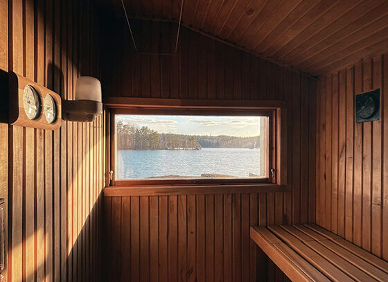 View of lake from window inside of Finnish Sauna