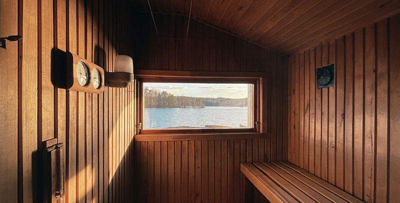 View of lake from window inside of Finnish Sauna